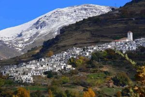 Old Arab village in the Sierra Nevavda and the Mulhacen top with snow on the background.